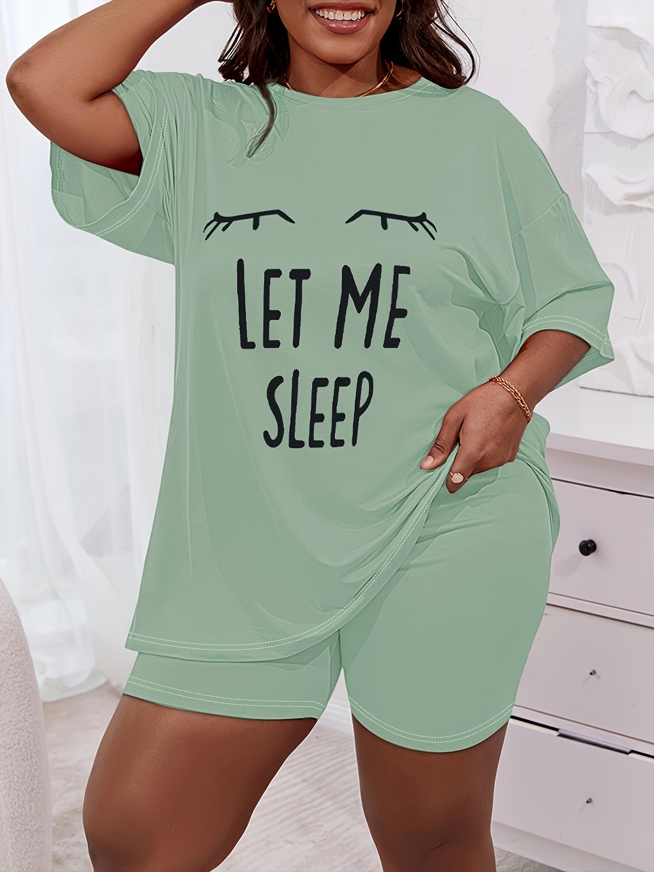 Plus Size Womens Comfort Lounge Set - Bold Eye & Slogan Print Tee with Shorts, Round Neck, Short Sleeve, Drop Shoulder - 2 Piece Casual Home Wear Set for a Stylish Relaxation